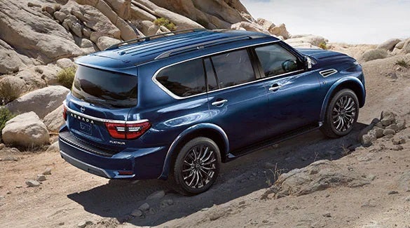 2023 Nissan Armada ascending off road hill illustrating body-on-frame construction. | Nissan of Bowie in Bowie MD