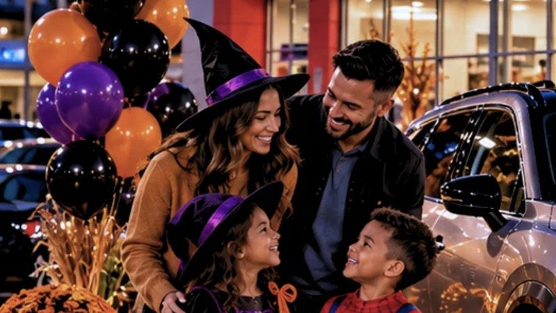 Family in Halloween costumes at the Nissan of Bowie trunk-or-treat